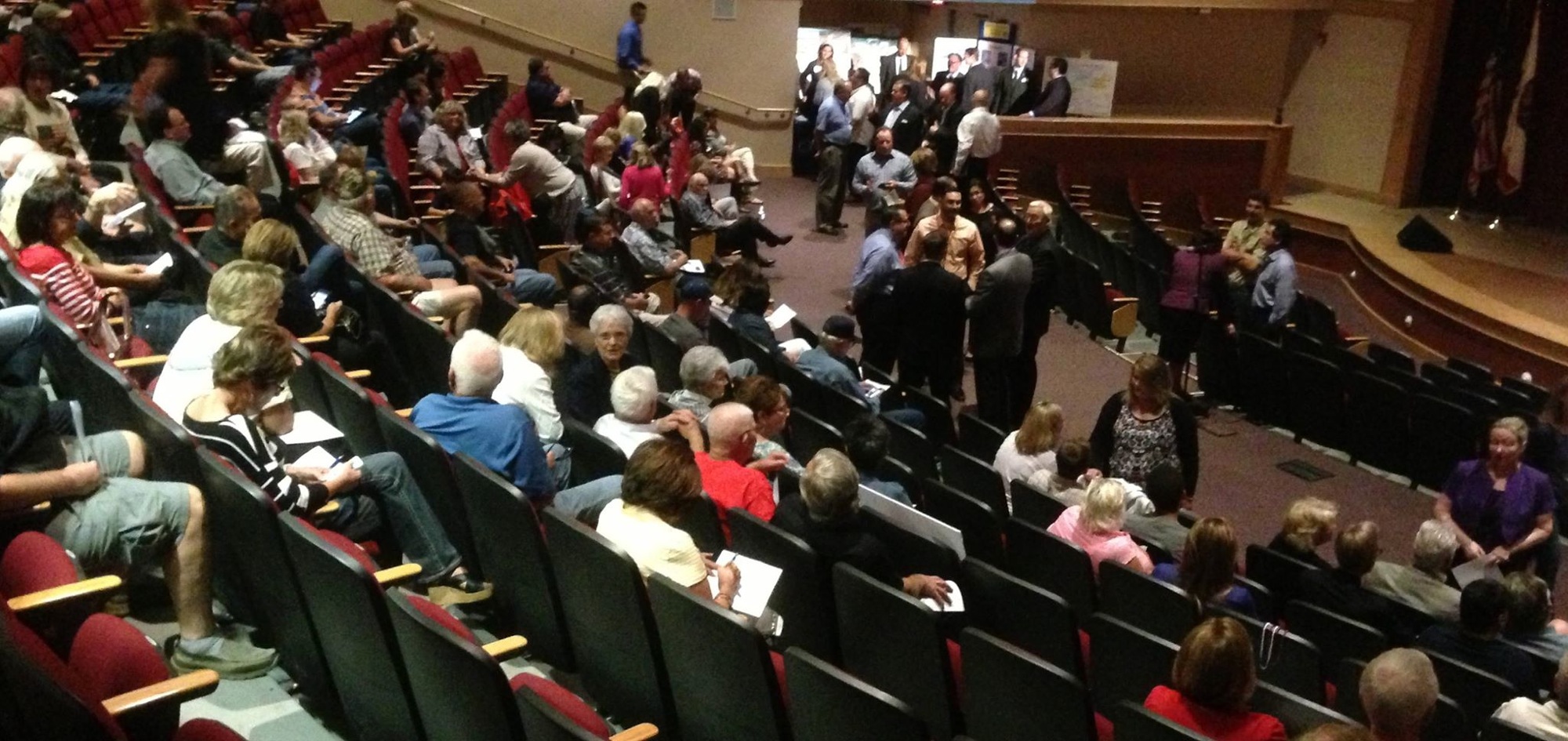 The auditorium fills with supporters